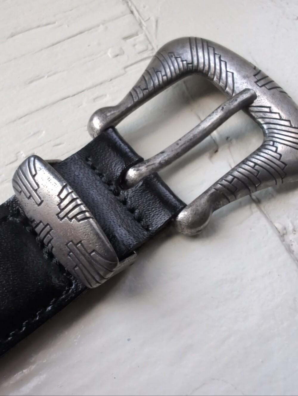 Vintage black leather braided belt with southwestern silver tone buckle
